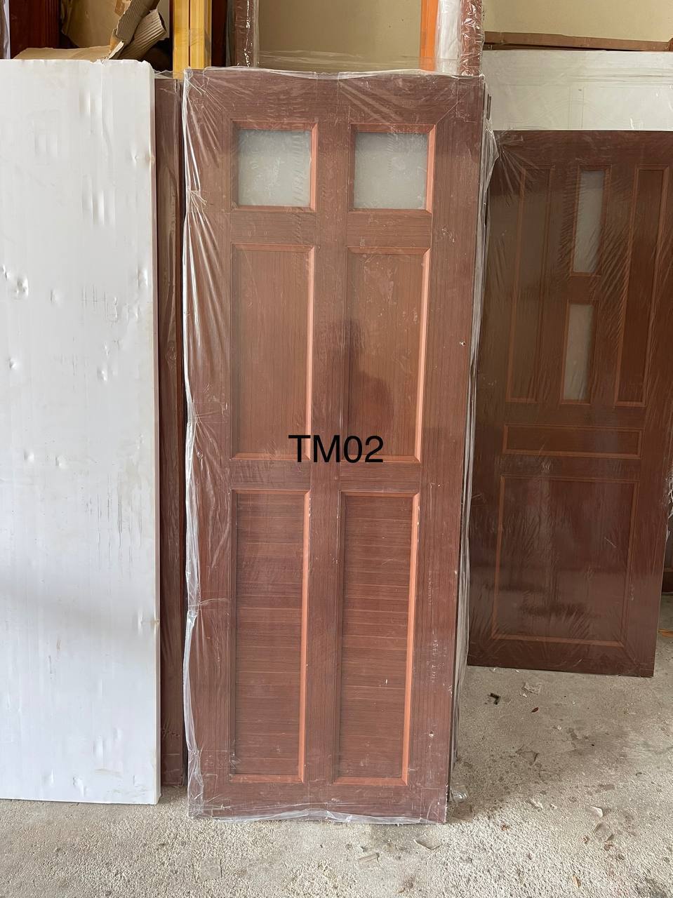 ទ្វាបន្ទប់ទឹក PVC Door 66*180cm TM02